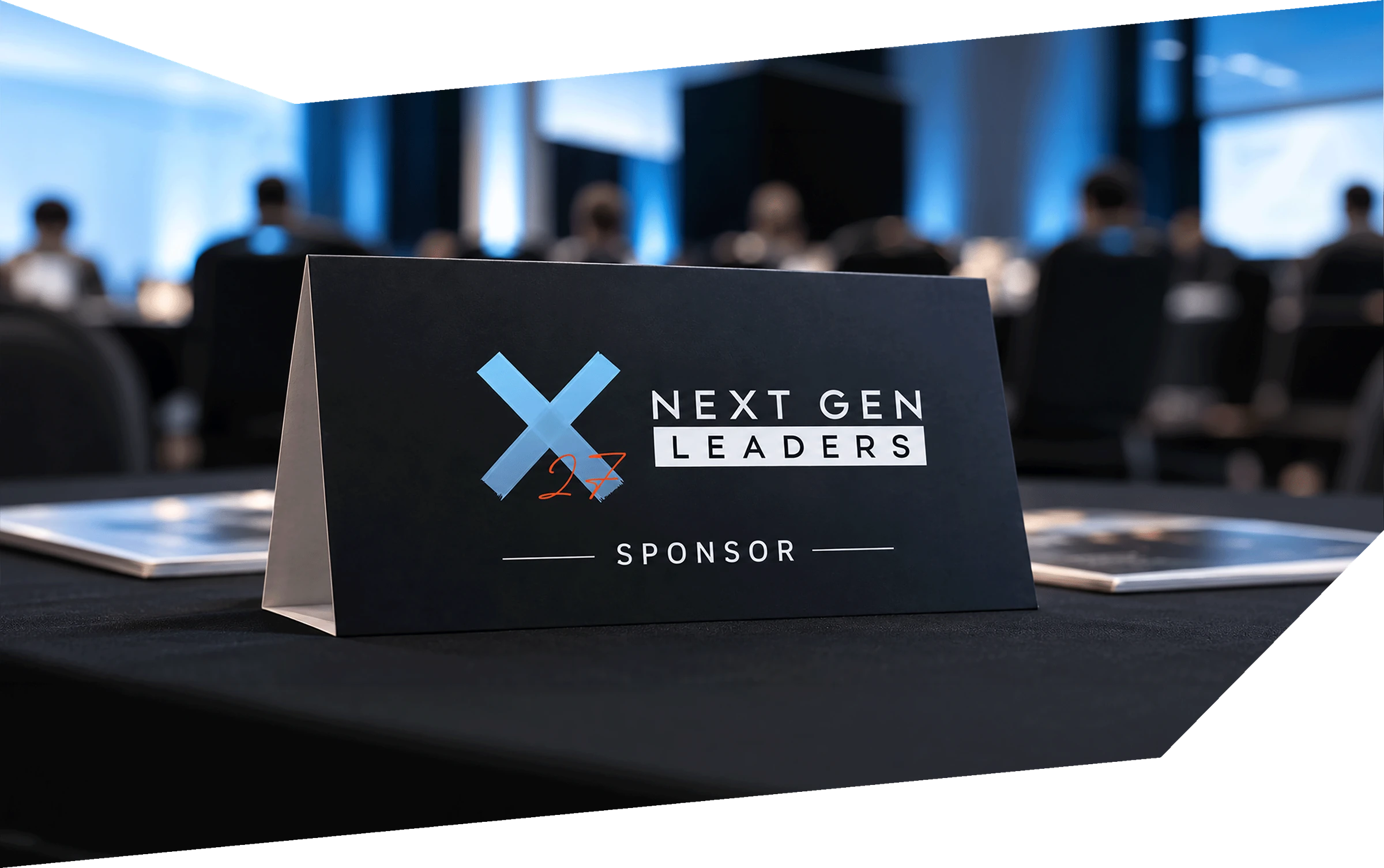X27 Next Gen Leaders sponsor table at the conference